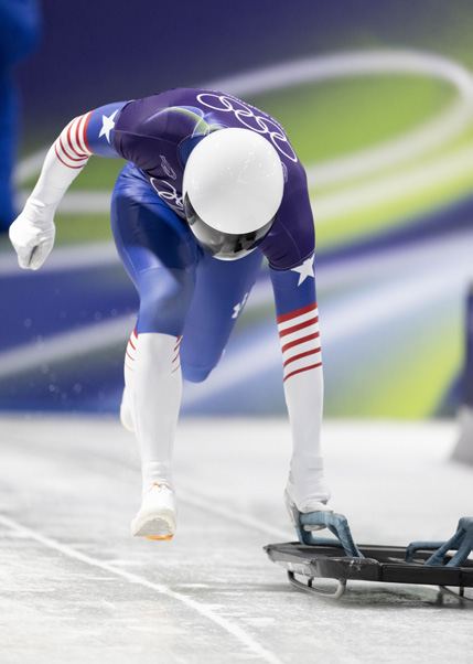 Dan Barefoot sprinting at the start of a skeleton run